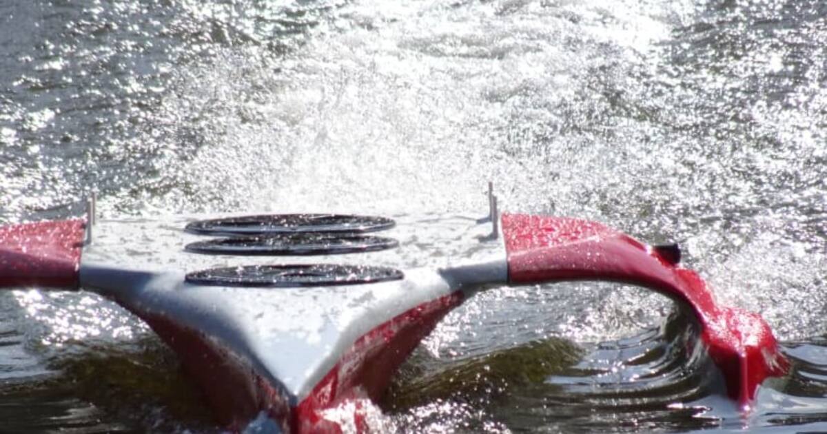 A Taniwha autonomous boat designed by X-Craft cuts through the water, illustrating the autonomous vessel technology context around Maidenfleet's Nelson fishing-boat plans.