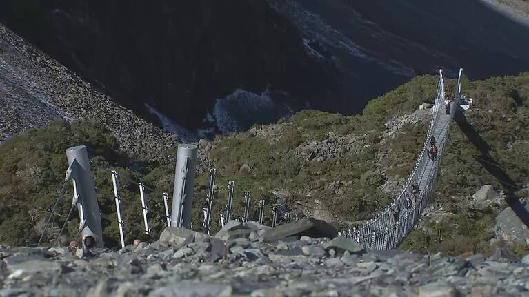 The new Hooker Valley suspension bridge spans 189 metres across the Hooker River in Aoraki Mount Cook National Park.
